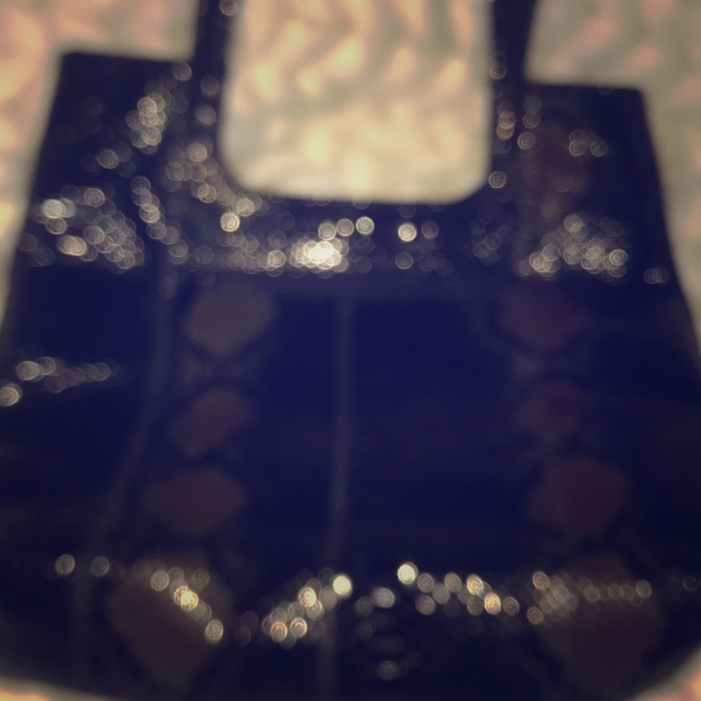 Sondra Roberts snake print bag